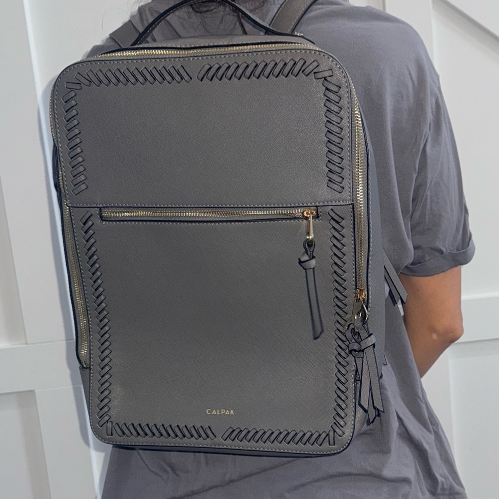 Calpak Gray Leather Backpack with Braided Trim and Gold Accents